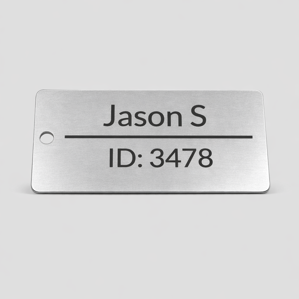 Metal ID tag with 'Jason S' and 'ID: 3478' on a gray background