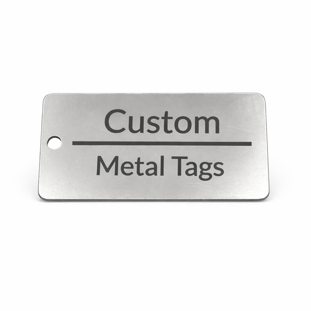 Metal tag with 'Custom Metal Tags' text on a white background